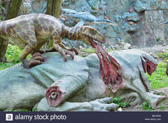 dinosaur-eating-another-dinosaur-BB1W2N.jpg